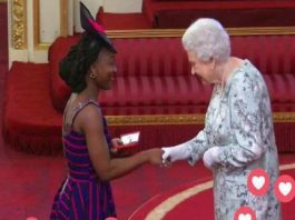 KUMBA MUSA RECEIVING AN AWARD FROM QUEEN ELIZABETH II AS A YOUNG LEADER KUMBA MUSA RECEIVING AN AWARD FROM QUEEN ELIZABETH II AS A YOUNG LEADER