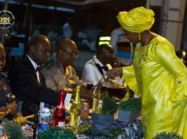 The president and First Lady of Sierra Leone host a festive dinner party